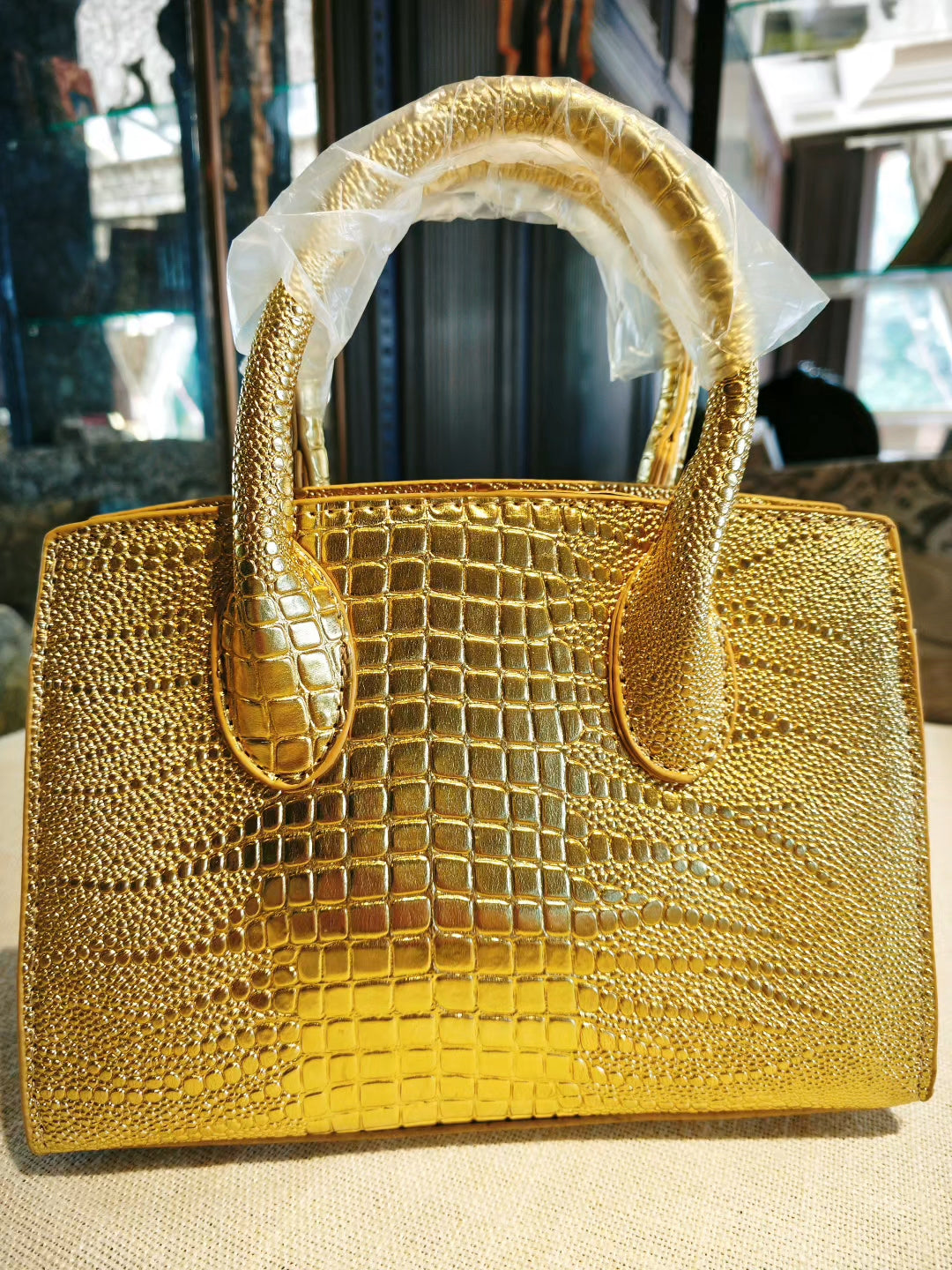 Luxury Gold Crocodile-Embossed Birkin Style Handbag with Classic Lock Design