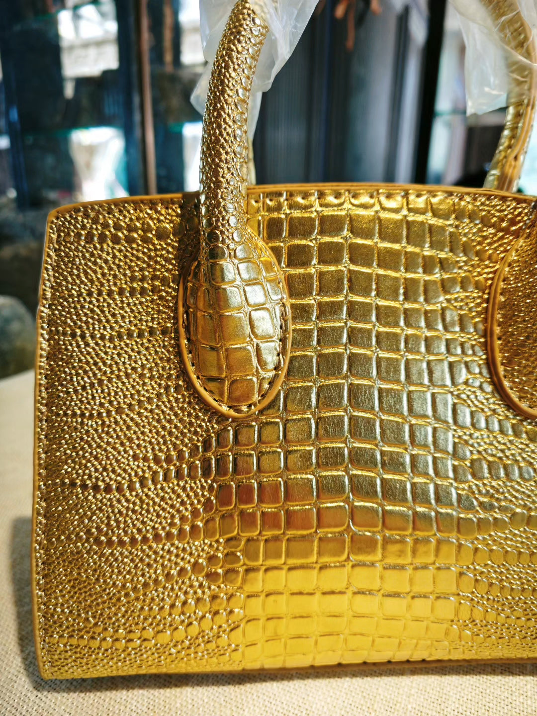 Luxury Gold Crocodile-Embossed Birkin Style Handbag with Classic Lock Design
