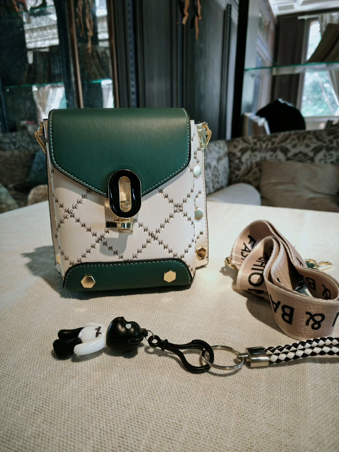 Green and White Patterned Mobile Phone Bag with Contrast Hardware