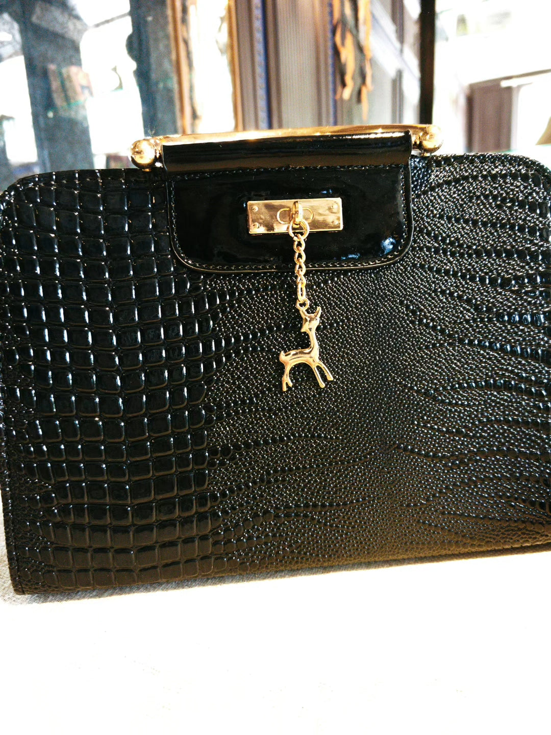 Black Crocodile-Embossed Top-Handle Boston Bag with Golden Deer Charm and Detachable Strap