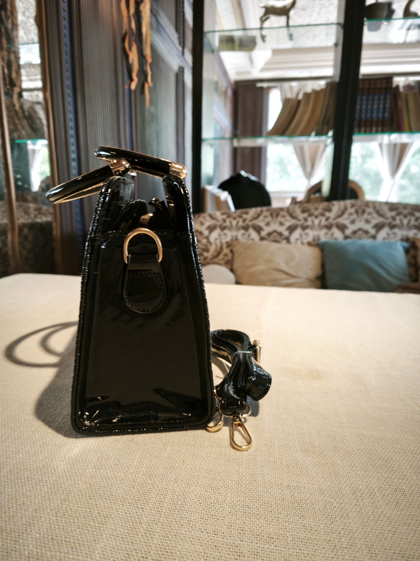 Black Crocodile-Embossed Top-Handle Boston Bag with Golden Deer Charm and Detachable Strap