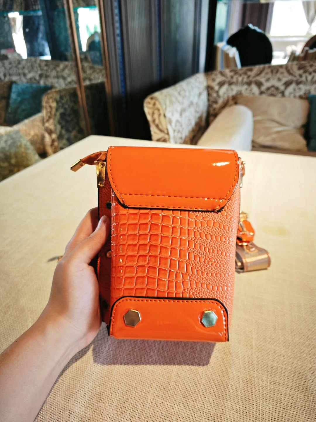 Orange Crocodile-Embossed Structured Mobile Phone Bag with Decorative Lock and Studs