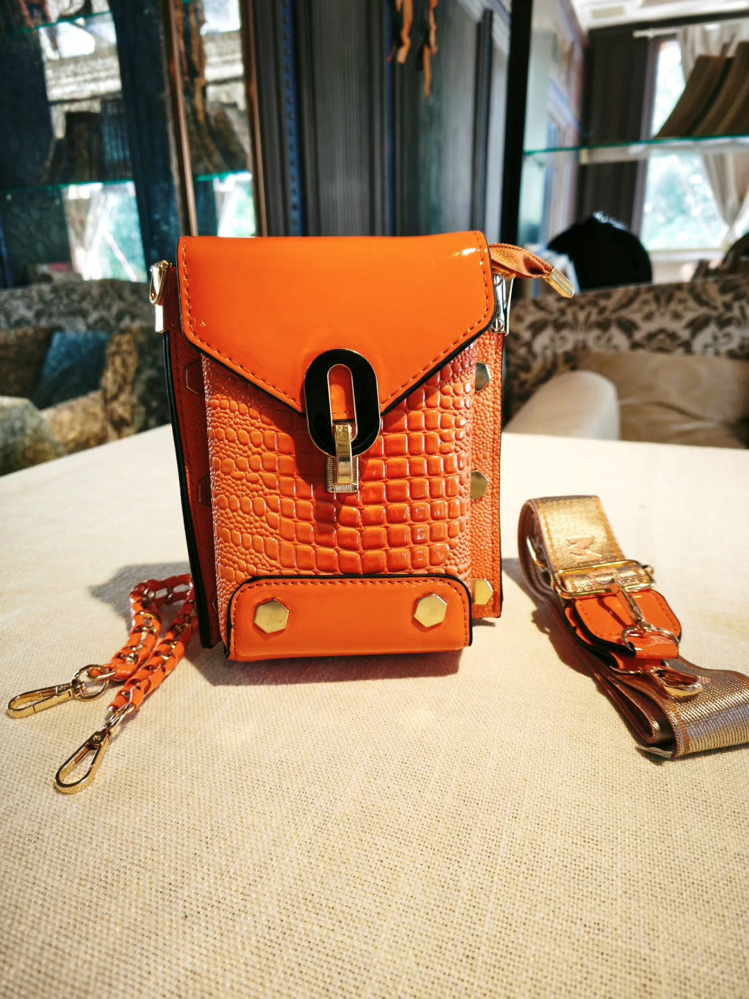 Orange Crocodile-Embossed Structured Mobile Phone Bag with Decorative Lock and Studs