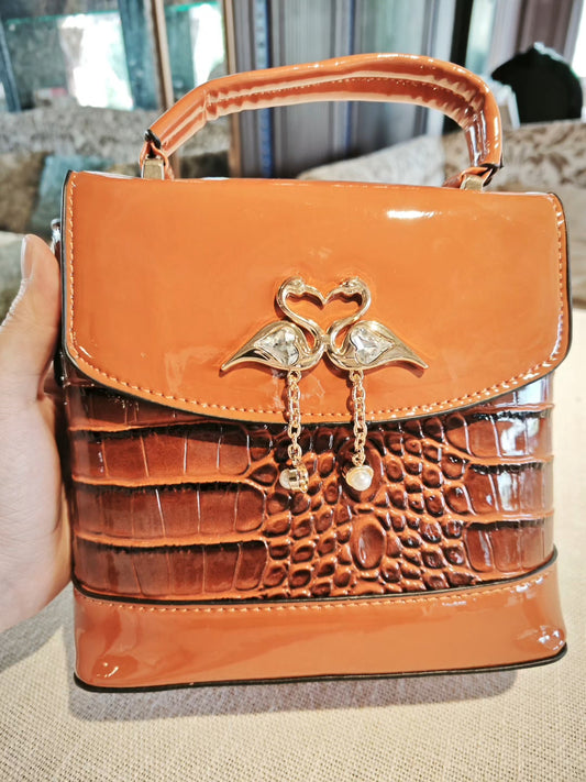 Brown Crocodile-Embossed Structured Medium Boxy Bag with Swan Charm and Detachable Strap