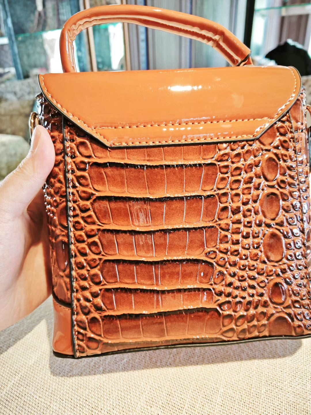 Brown Crocodile-Embossed Structured Medium Boxy Bag with Swan Charm and Detachable Strap