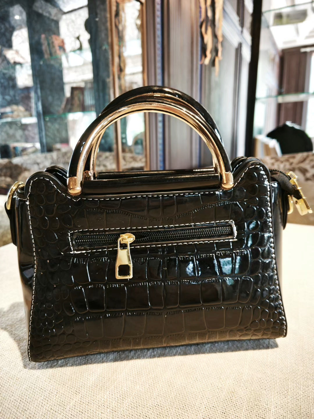 Black Crocodile-Embossed Structured Hand Bag with Golden Top Handle and Detachable Strap