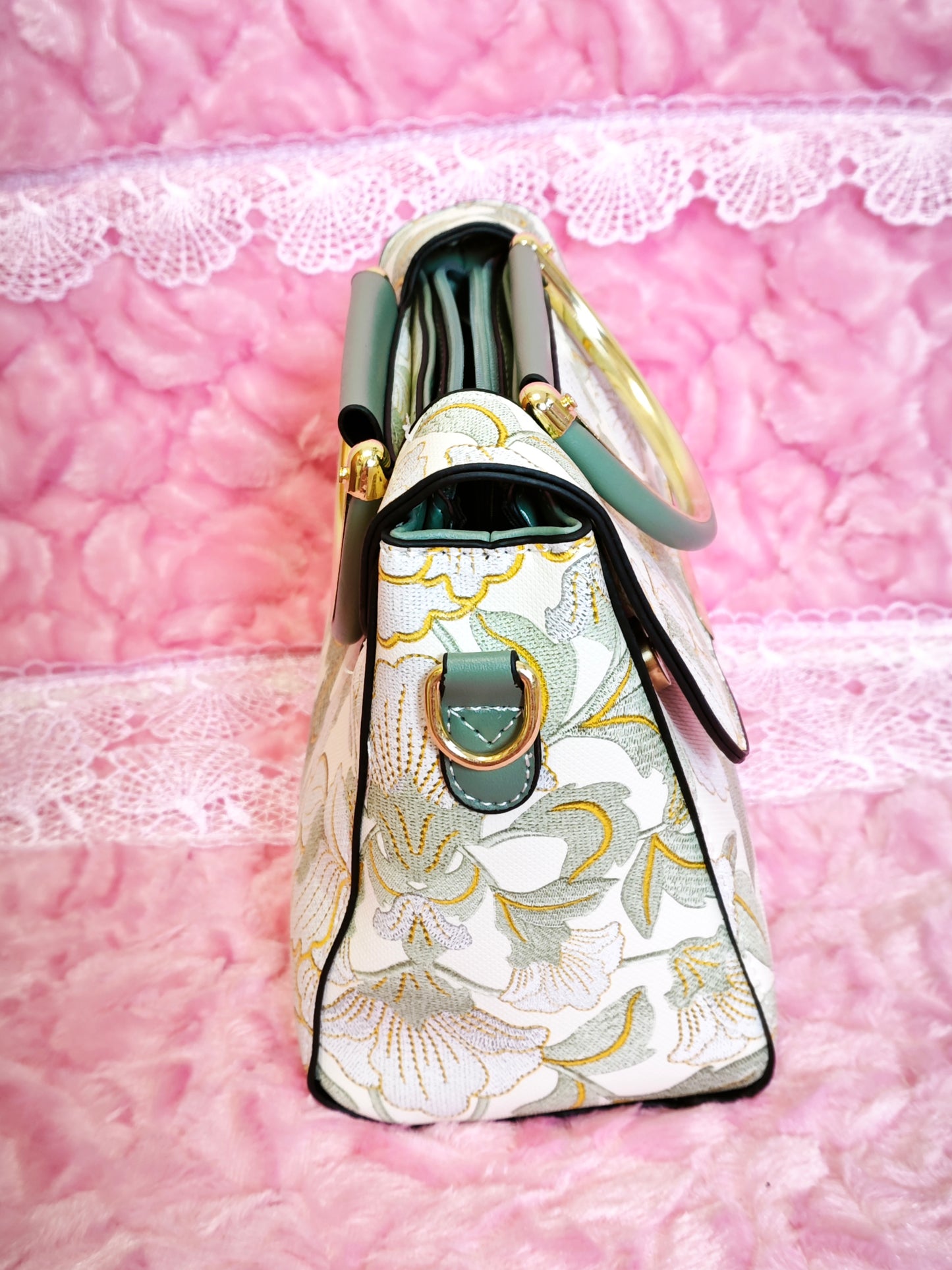 White Floral-Patterned Handbag with Dark Green Accents