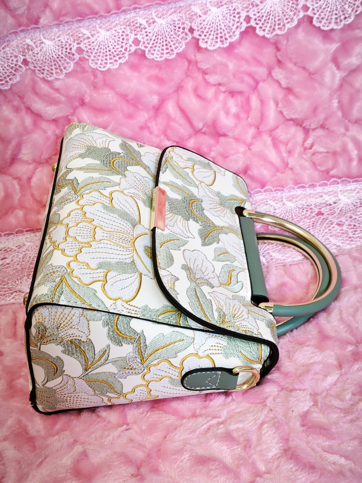 White Floral-Patterned Handbag with Dark Green Accents